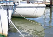 Krypton paint worn away on the bow at the waterline. On the plus side, this means there will be no build up that will need to be sanded off. Next time, we’ll give this area a few more coats. (Photo/ Drew Frye)