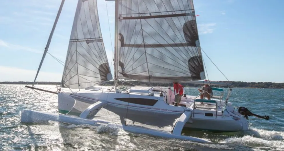 This guide’s “20- to 30-foot sailboat” range is a rough guide. The 32-foot Corsair 970 trimaran pictured above, which weighs only 4,000 pounds unladen, is often fitted with a 9.9 hp gas outboard. Count on needing a minimum of 1 hp for every 1,000 pounds of displacement. (Photo/ Corsair Marine)