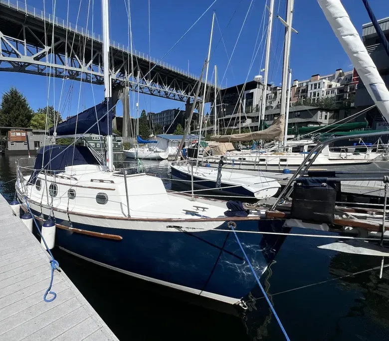 The Dana 24's traditional lines reflect designer Bill Crealock's emphasis on seaworthiness over dockside appeal. This hip-pocket cruiser's nearly plumb bow and stern, combined with her 36-in. bowsprit, create a classic ocean-cruiser profile that belies her compact 24-ft. length. Courtesy of Yachtworld.com