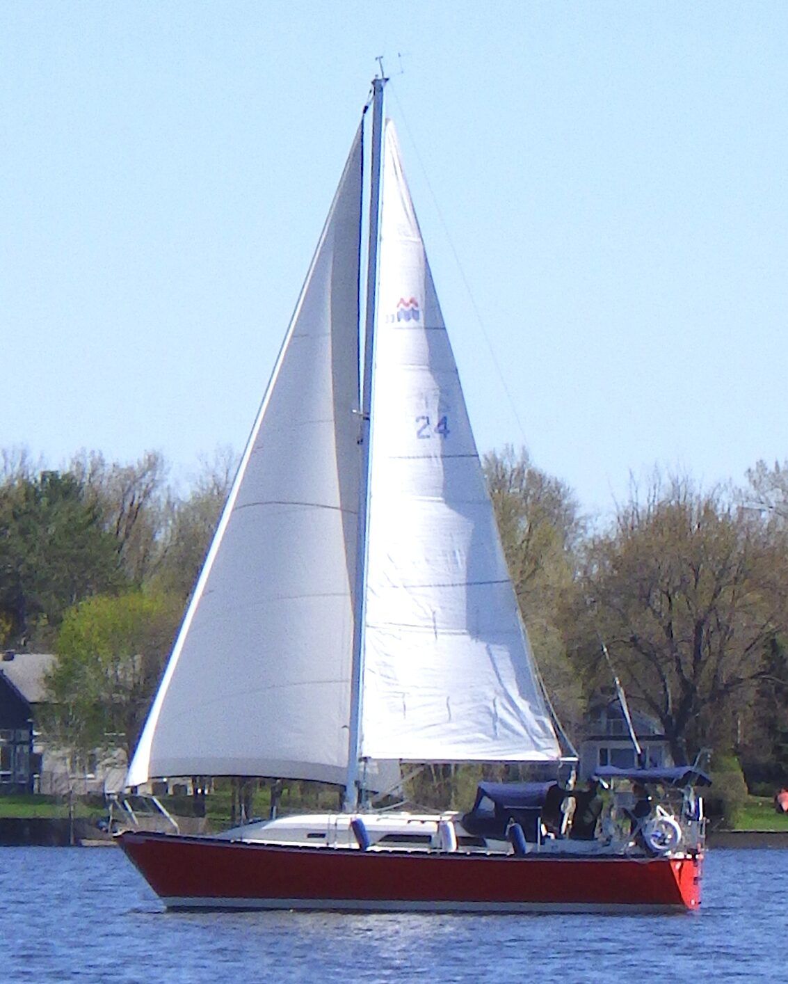 The Mirage 33's clean lines and moderate displacement deliver balanced performance for Great Lakes cruising, with her bolted fin keel drawing five feet and graceful sheerline characteristic of Robert Perry's design work. 