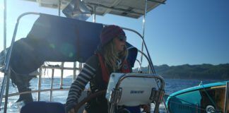 The author helming out of the Juan De Fuca at the start of the trip into the Pacific. (Photo/ Jaclyn Jeffrey)