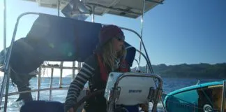 The author helming out of the Juan De Fuca at the start of the trip into the Pacific. (Photo/ Jaclyn Jeffrey)