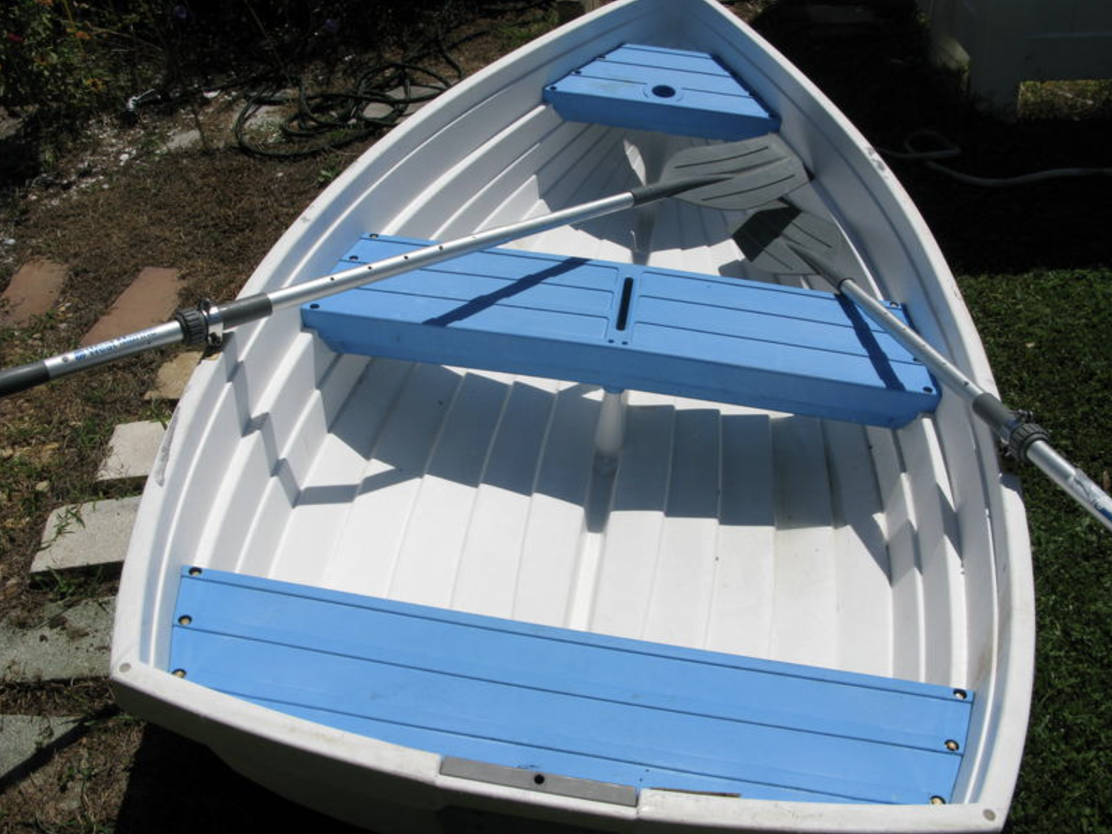 Walker Bay 8: Walker Bay's injection-molded polypropylene construction features ersatz lapstrake planking that adds structural rigidity to the lightweight hull. Courtesy of SailboatListings.com