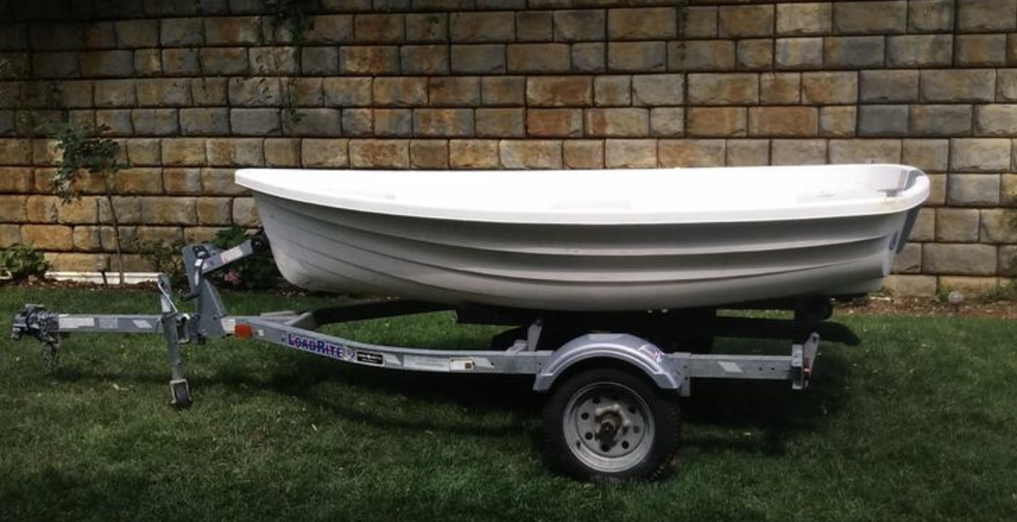 The larger Walker Bay 10 carries more sail area (46 sq. ft.) and accommodates up to three crew members, making it suitable for serious dinghy cruising. However, the 10 required careful weight distribution to achieve proper sailing trim, particularly in stronger winds above 10 knots. Photo courtesy of SailboatListings.com