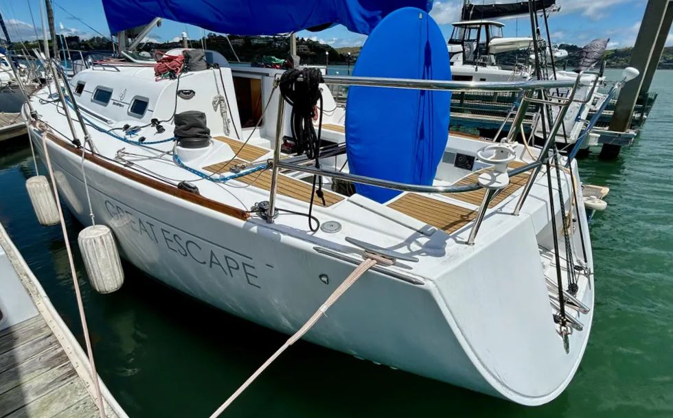 The 36.7's construction emphasizes weight control critical for one-design racing, with vinylester resins to prevent osmotic blistering and a one-piece internal grid system that distributes mast and keel loads throughout the hull structure. Courtesy of Yachtworld.com