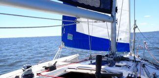 Winch feeder in service, shaking out a reef. (Photo/ Drew Frye)