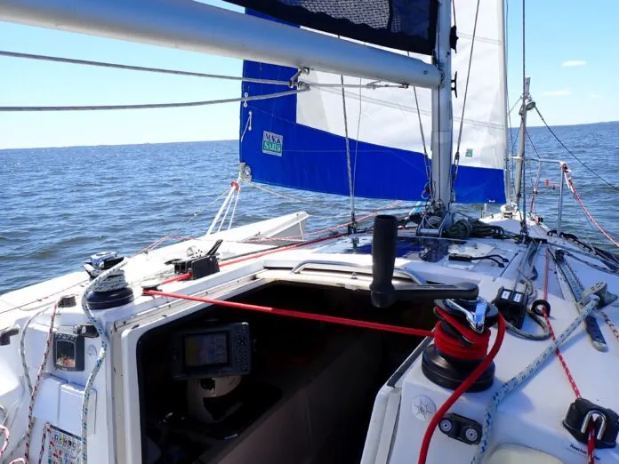 2. winch feeder in service, shaking out a reef Winch feeder in service, shaking out a reef. (Photo/ Drew Frye)