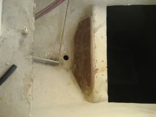 Reinforced motor mount. I’ve had to fix this on two boats. In both cases, the builder used cored construction under the bolts, which crushed under pressure, and the POs filled the dented core with MarineTex. This was a cosmetic repair. What was needed was reinforcement with a plate. Both motors came loose underway, one I nearly lost. (Photo/ Drew Frye)