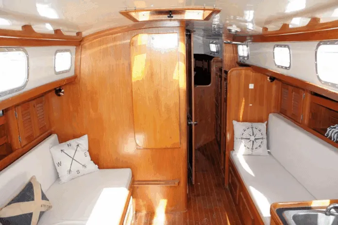 Bristol's mahogany interior provides a lighter, brighter alternative to traditional teak joinery. The built-up construction allowed multiple layout options during the 20-year production run. Courtesy of YachtWorld.com