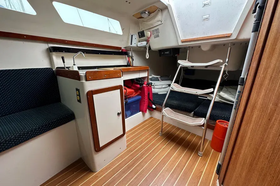 Cabin headroom measures just 4 ft. 6 in. at the galley, considerably less than competing designs like the Hunter 26. Courtesy of Boattrader.com