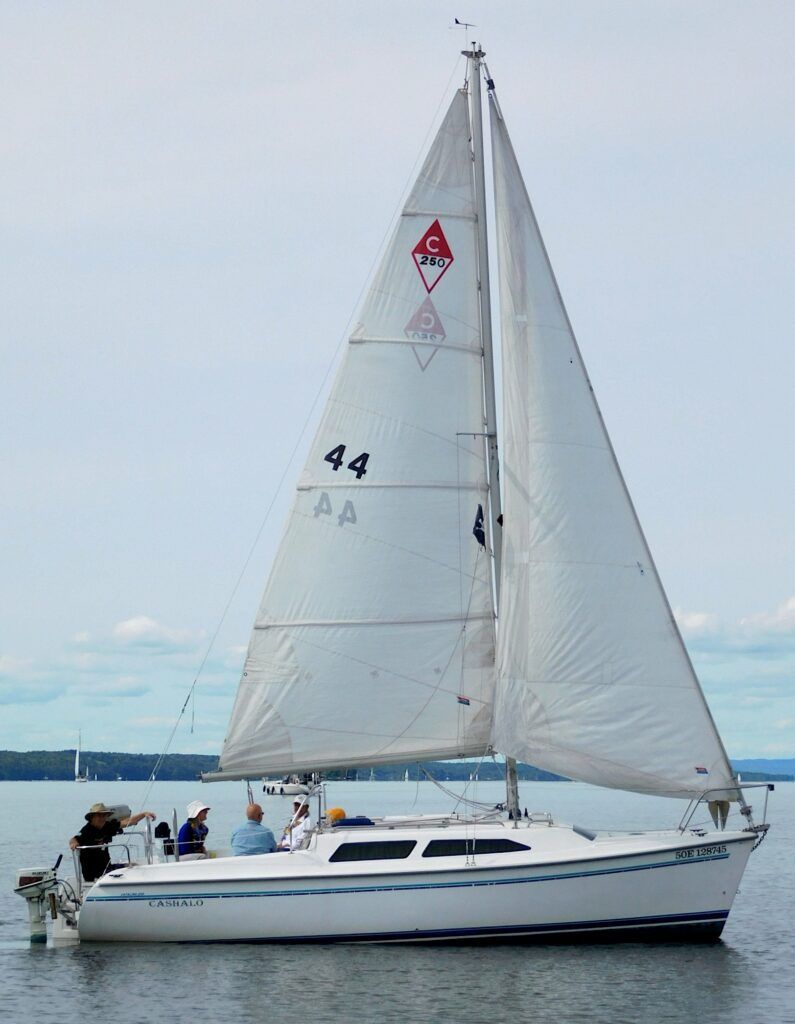 The Catalina 250's wide 8.5-foot beam, shallow draft and full-battened mainsail provide stability, despite the water ballast system's limitations compared to traditional lead keel designs.