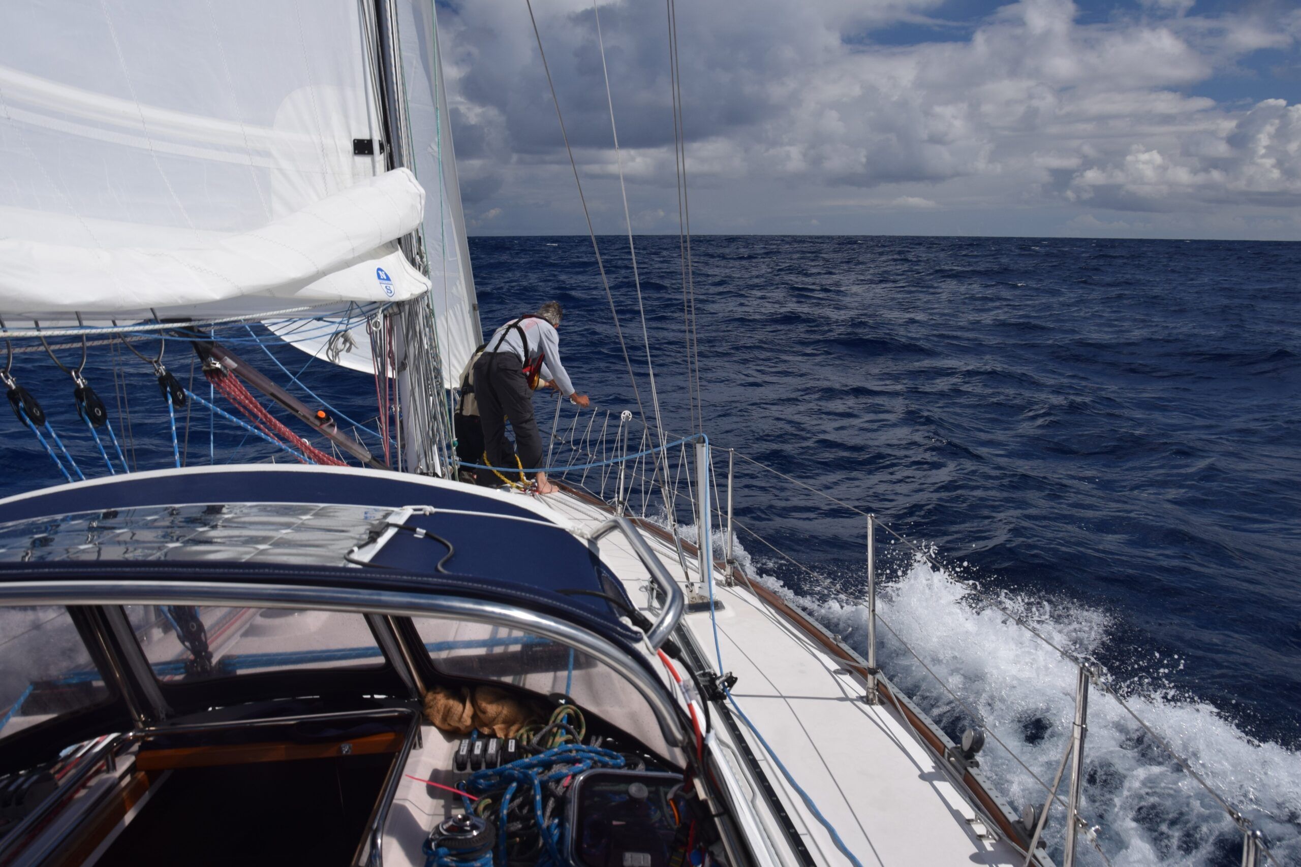 Rick and Chris work at resolving a furler issue. (Photo/ Bert Vermeer)