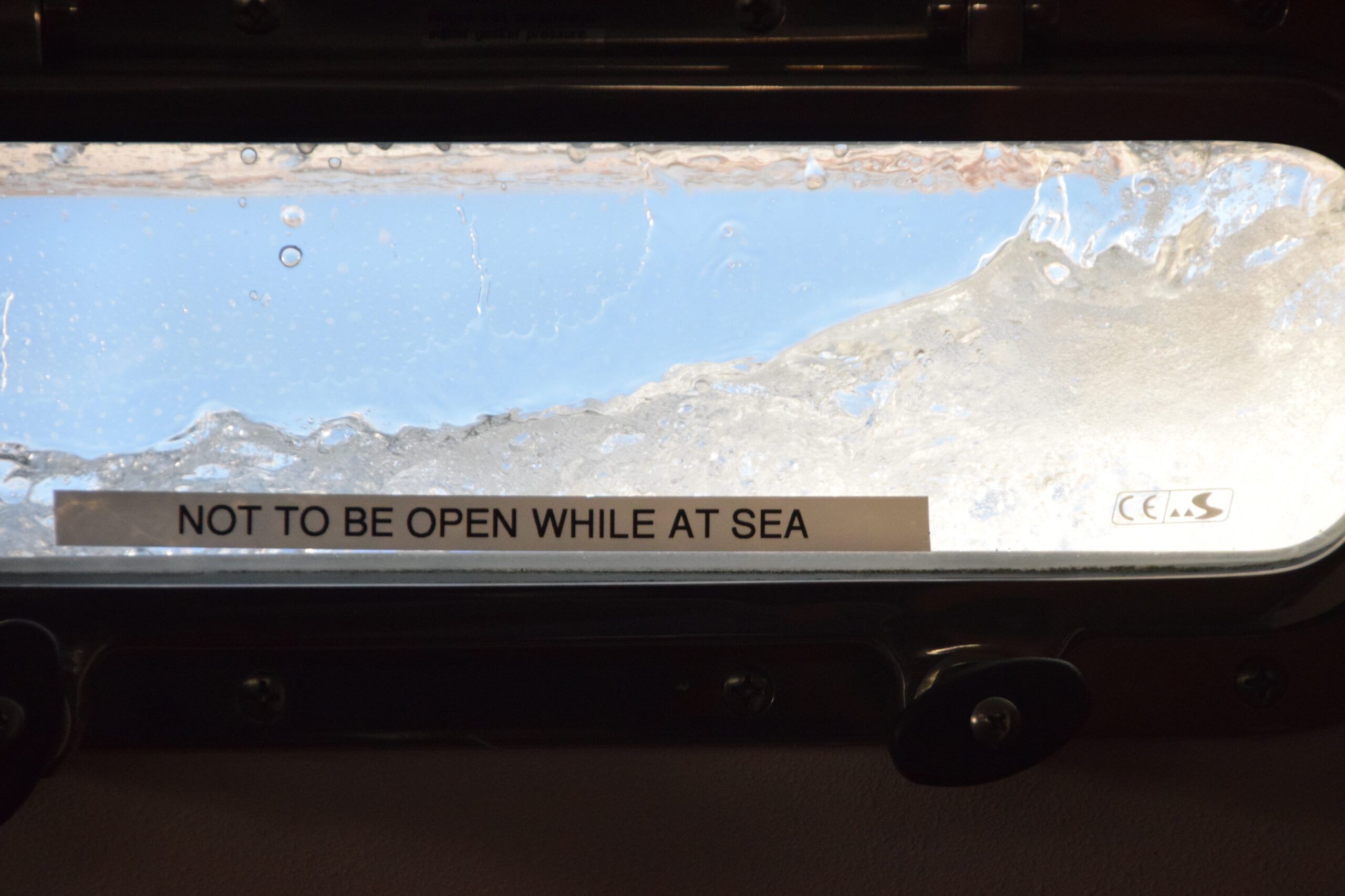 Not that a reminder was necessary! Solid water over the windward portlights as the waves rise to epic proportions. (Photo/ Bert Vermeer)