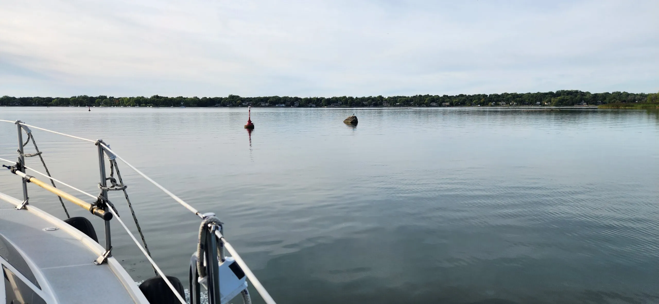 This rock is normally invisible under water about 20 feet outside the red channel marler. This might give many boaters pause as they realize that Safe Boating and Navigation Courses may not be such a bad idea after all. (Photo/ Marc Robic)