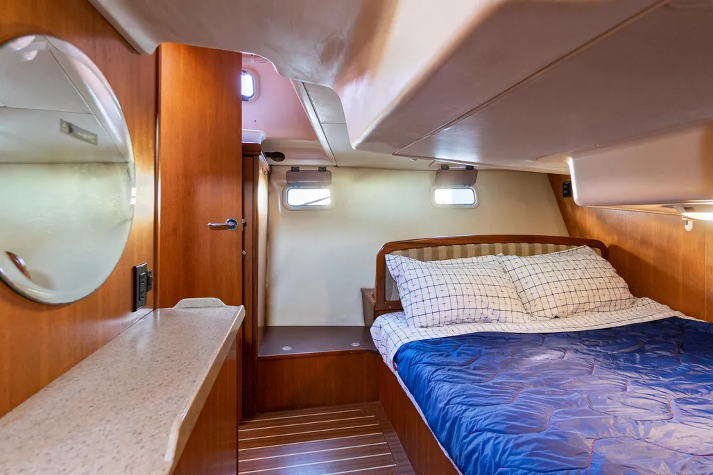 The owner's version features a commodious aft stateroom with a 78-in. long, 60-in. wide berth. Courtesy of YachtWorld.com