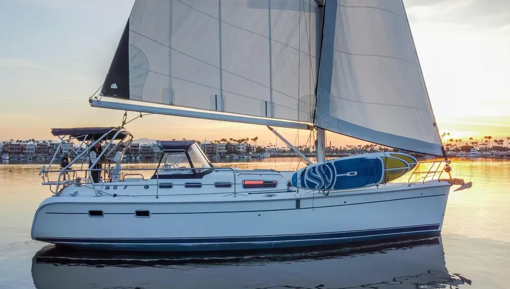 The Hunter 38 features a near-plumb bow and fine entry forward, contrasting with her beamy 12-ft. 11-in. stern section designed for maximum cockpit space and interior volume. Courtesy of YachtWorld.com