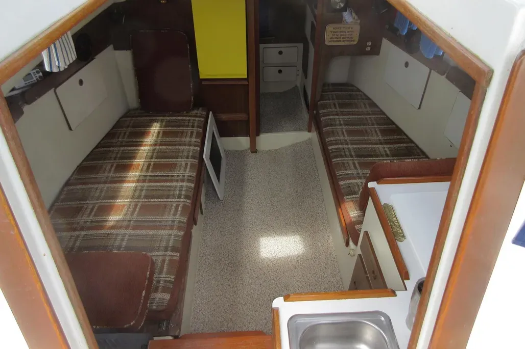 The Pearson 30's main cabin is large and comfortable for a 30-footer, with capacious storage and honest 5-ft. 11-in. headroom. Courtesy of YachtWorld.com