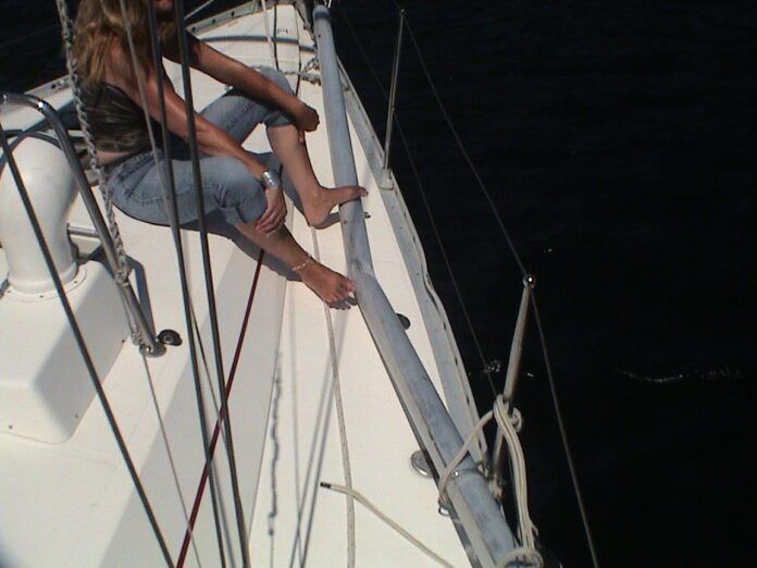 Carey checking out the collision damage. (Photo/ Bert Vermeer)