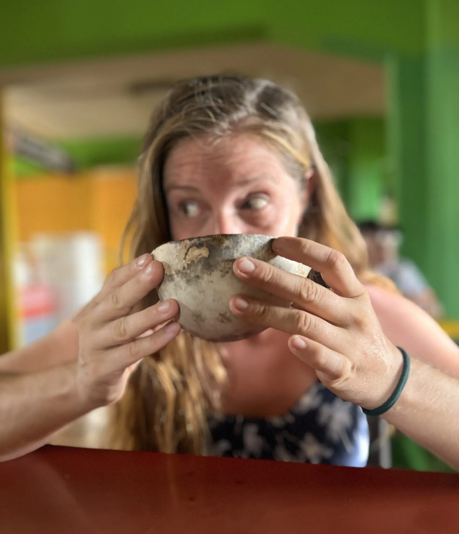 Trying a local food called chilate. It is a warm spiced corn and water drink that tastes like chai. (Photo/ Jaclyn Jeffrey)