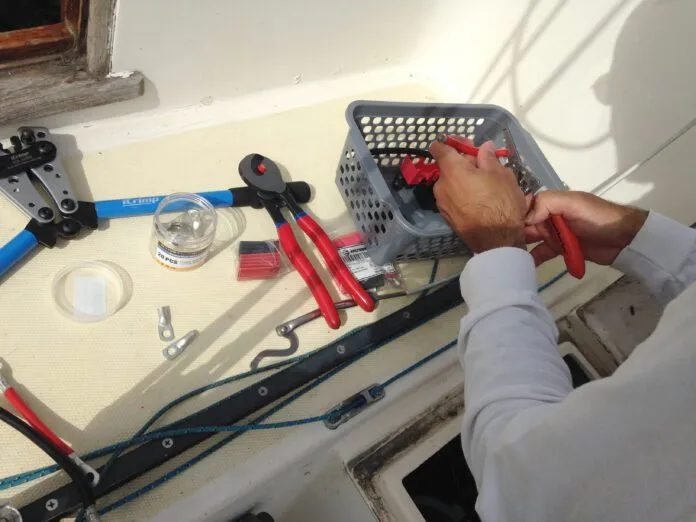 IMG_2316 Stripping wire and crimping the lugs on for the lithium conversion. (Photo/ Nicholas Koiter)