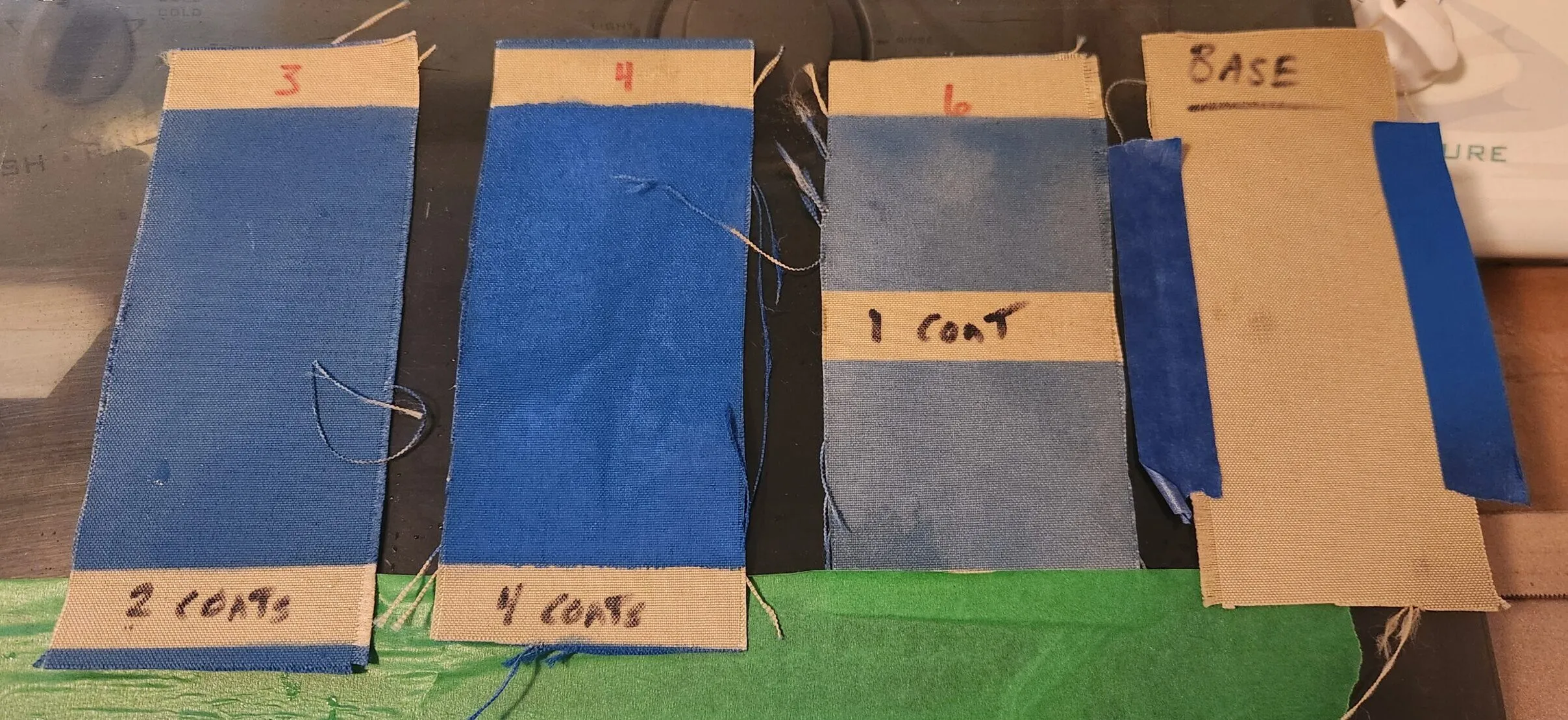 Samples after 2-month exposure. From left to right: 2 coats, 4 coats, 1 coat, uncoated. (Photo/ Marc Robic)
