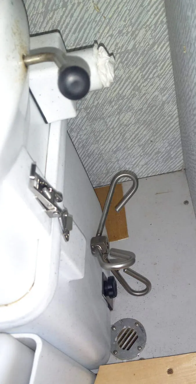Spider foot pedal on the Nature's Head composting toilet. This is what you press whenever you are in the head to help the composting process along. (Photo/ Pamela Bendall)