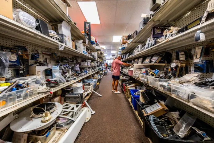 The author's 13-year-old Garmin GMR 18 HD radar served faithfully before failing early in the New England boating season, prompting a search through the secondhand marine electronics market for a compatible replacement. These are the stocked aisles at Marine Consignment of Wickford, Rhode Island. (Photo/ Todd Vorenkamp)