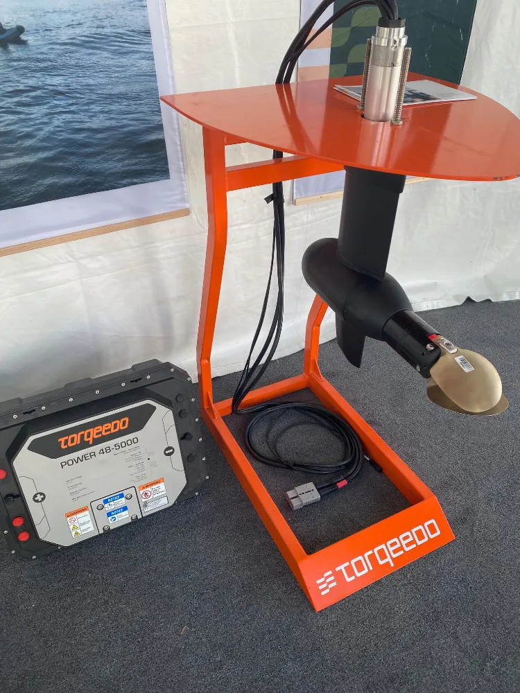 A Torqeedo Cruise pod drive shown with a folding prop and the required 48 volt/5000 watt hour battery. (Photo/ Doug Henschen)