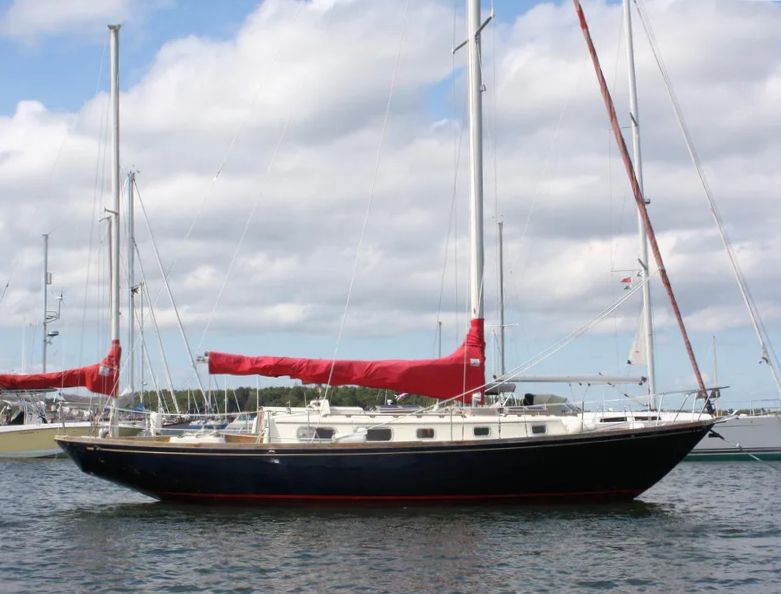 The Bristol 40's low freeboard and narrow cabin trunk are typical of traditional yachts. The long cockpit provides ample seating for daysailing but may be vulnerable to boarding seas in heavy offshore conditions. Courtesy of YachtWorld.com