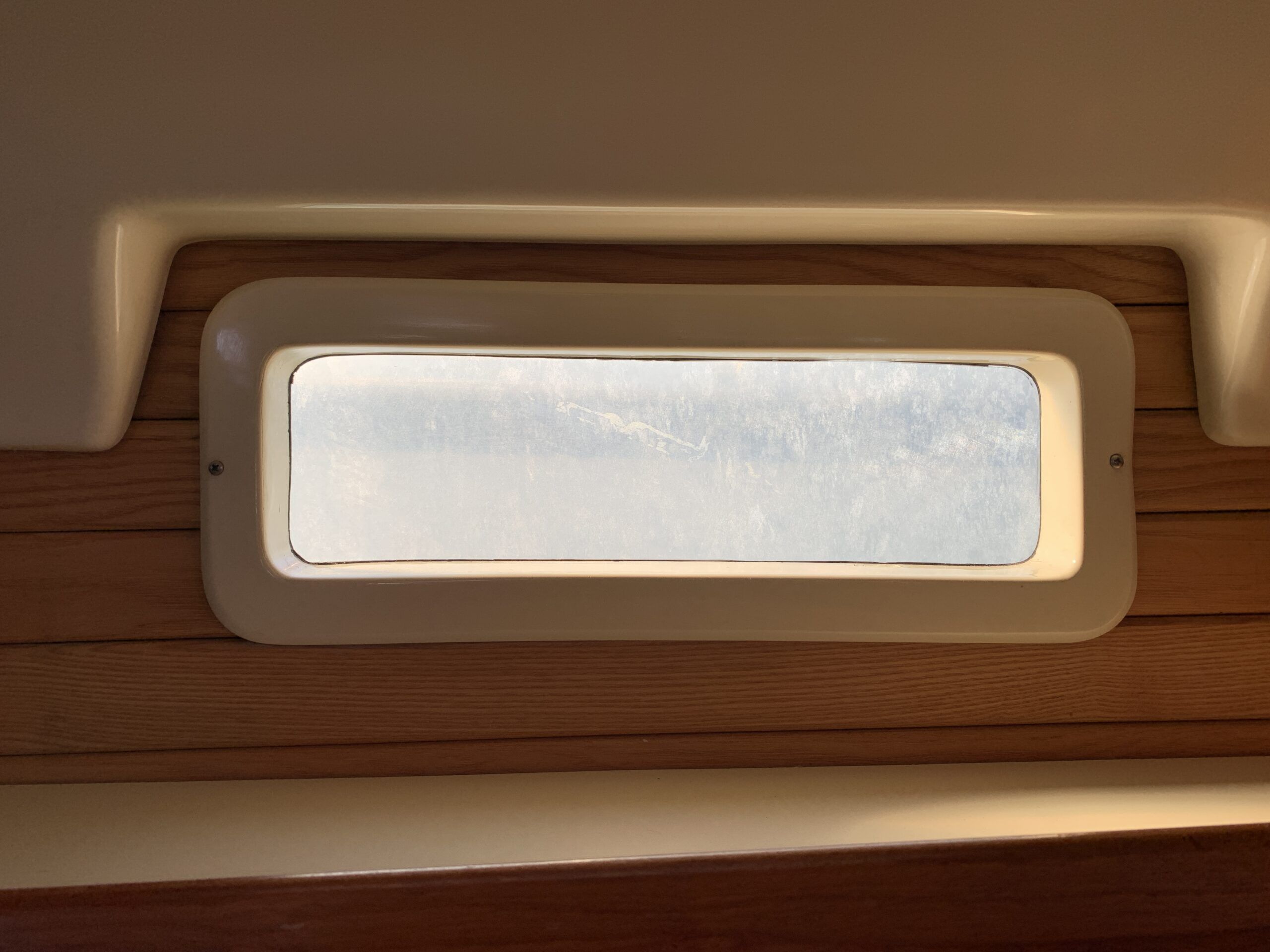 With old plexiglass, crazing and scratches obscure the view. (Photo/ Bert Vermeer)