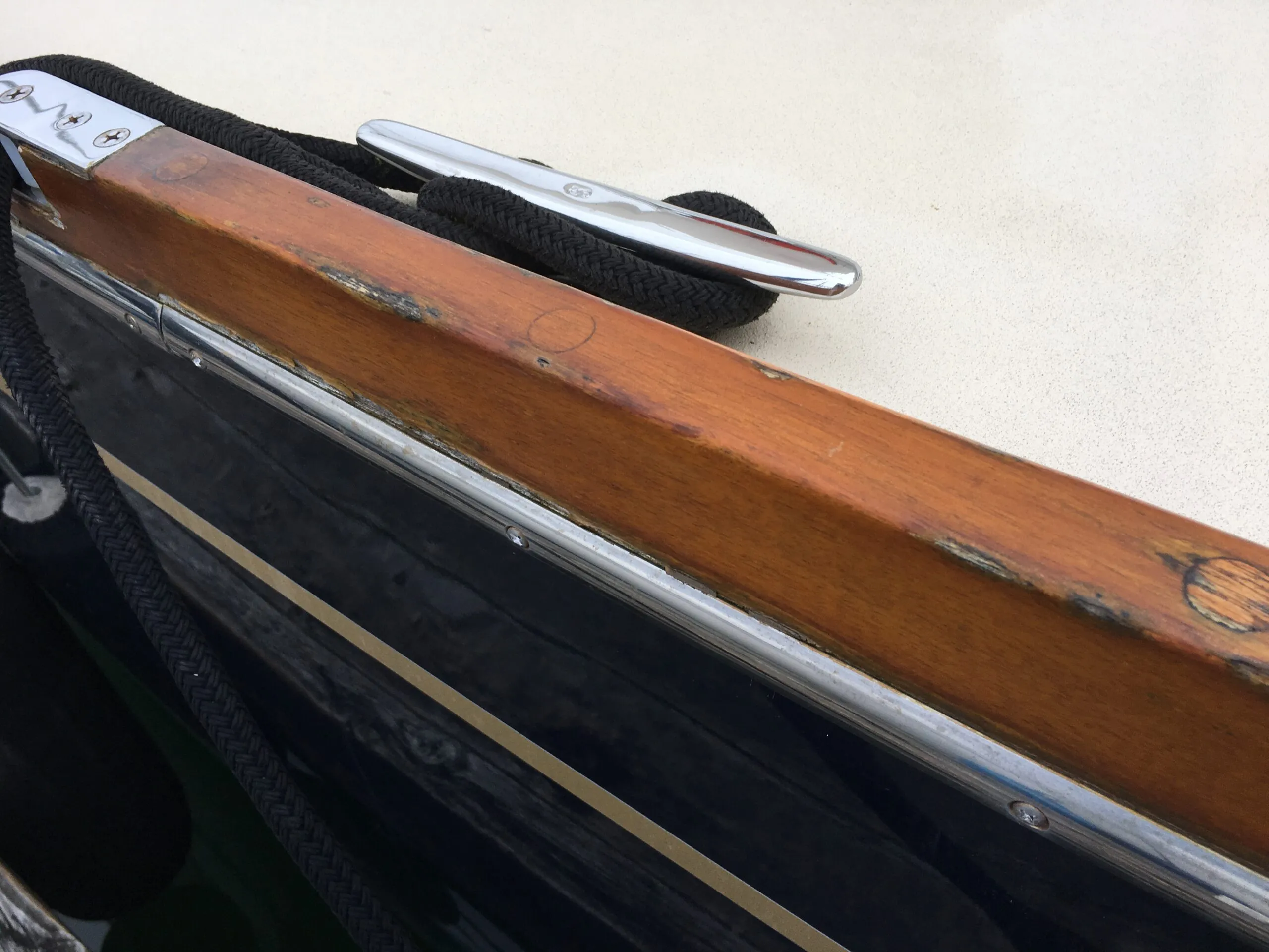 Weather damaged toe rail on a Tartan 3400. (Photo/ Bert Vermeer)