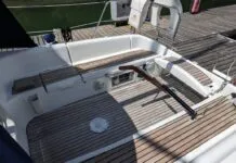 Jeanneau Sun Odyssey 32 Used Boat Review The Sun Odyssey 32's tiller steering is a notable feature for a 32-ft. cruising boat. It allows for easy movement forward and aft in the cockpit and the ability to lift the tiller completely out of the way when the boat is at rest. This opens the cockpit entirely—a trade-off for the loss of a central pedestal that would otherwise house instruments and controls. Courtesy of Yachts.co