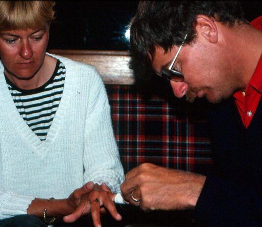 A bit of triage for Carey's ripped fingers. (Photo/ Bert Vermeer)