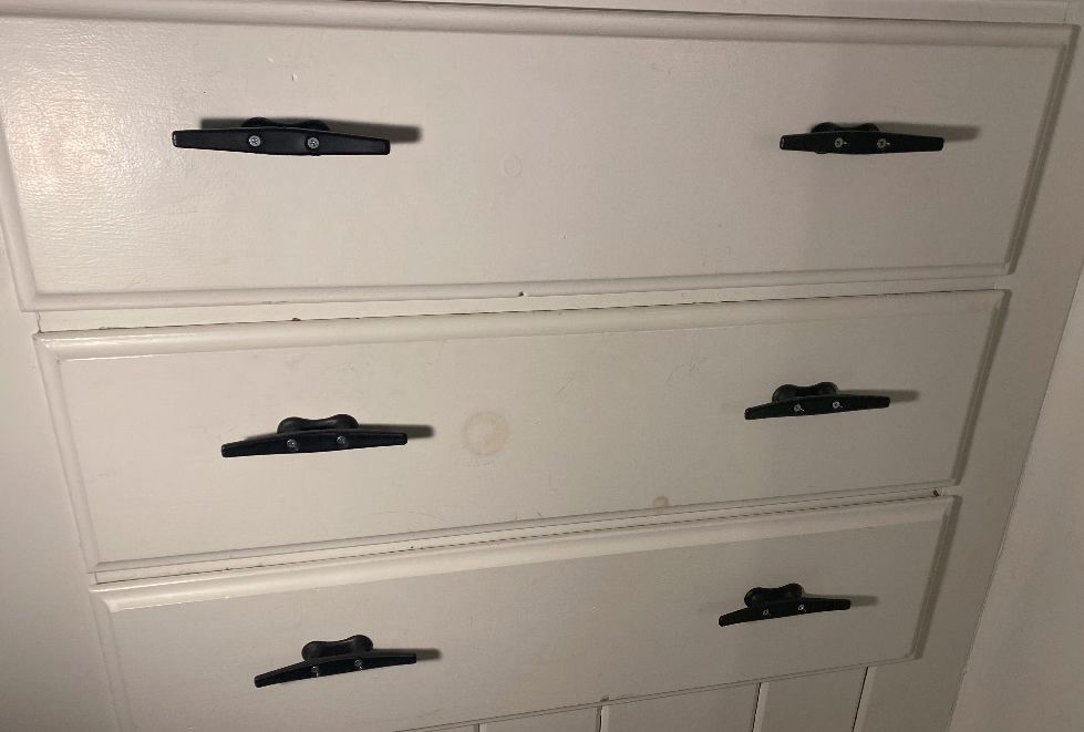 Old marine hardware such as cleats can find new uses in your home, serving as door handles or, as seen here, drawer pulls. (Photo/ Doug Henschen)