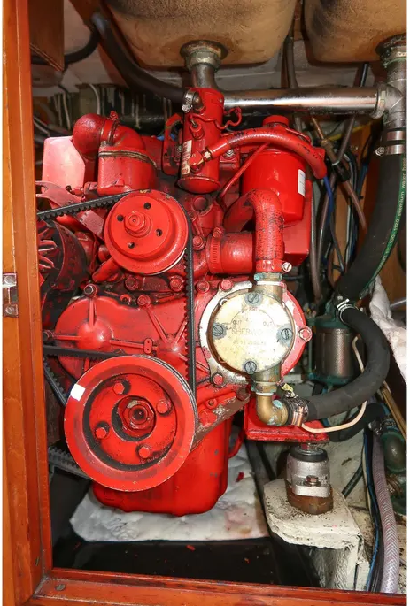 The 37-hp Westerbeke 4-107 diesel served as the standard auxiliary for Bermuda 40s over decades of production. It was test-run for several hours at the factory before installation and upgraded with a 105-amp alternator to charge house batteries—though owners note the tight engine compartment makes access challenging. Courtesy of YachtWorld.com