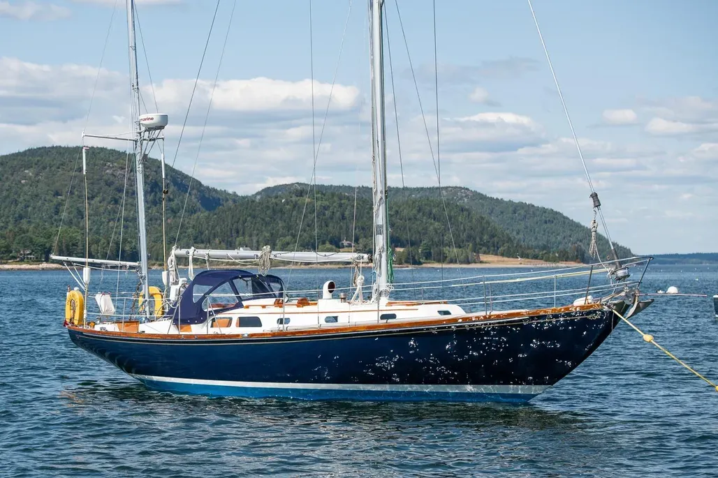 Bill Tripp's centerboard design showcases the generous overhangs and graceful sheerline that made the Bermuda 40 a standout when introduced in 1959, with production extending through the early 1990s. Courtesy of YachtWorld.com