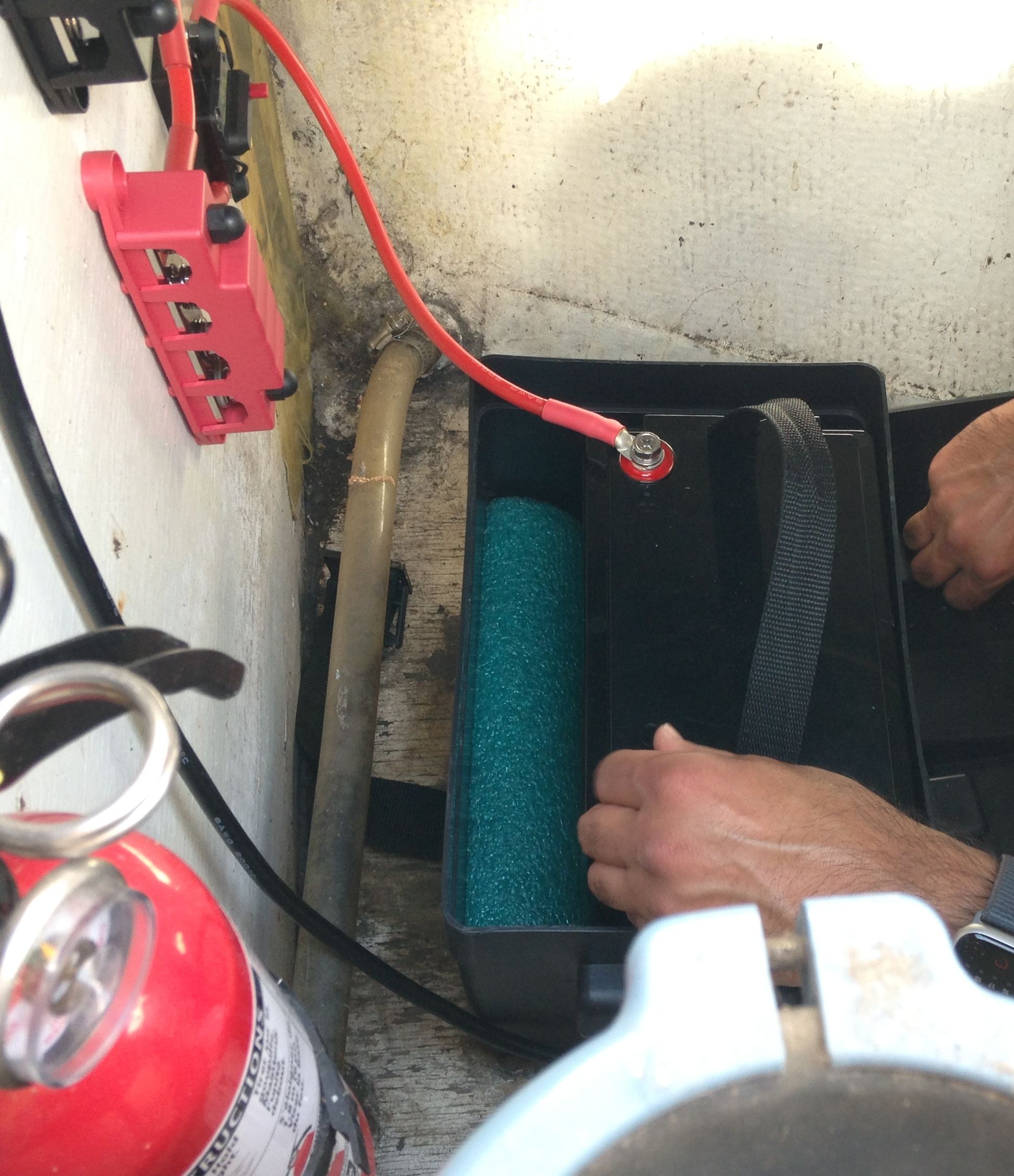 Snug in the battery box, with a pool noodle roommate. (Photo/ Nicholas Koiter)