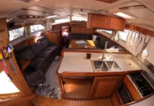 Clean, bright interiors with quality finishes characterize this well-maintained 2005 example. The Morgan 440's U-shaped salon seating and practical storage reflect Catalina's cruiser-oriented design philosophy. Photo courtesy of YachtWorld.com