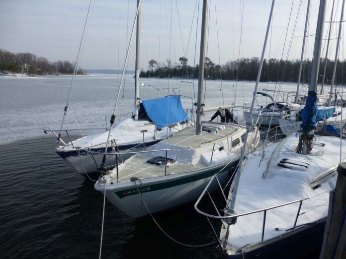 Ice buildup and frozen mooring lines are obvious winter hazards, but the hidden threat lies below deck. Cold temperatures cripple battery performance and leave unprepared cruisers without heat, engine start, or electrical power. (Photo/ Drew Frye)