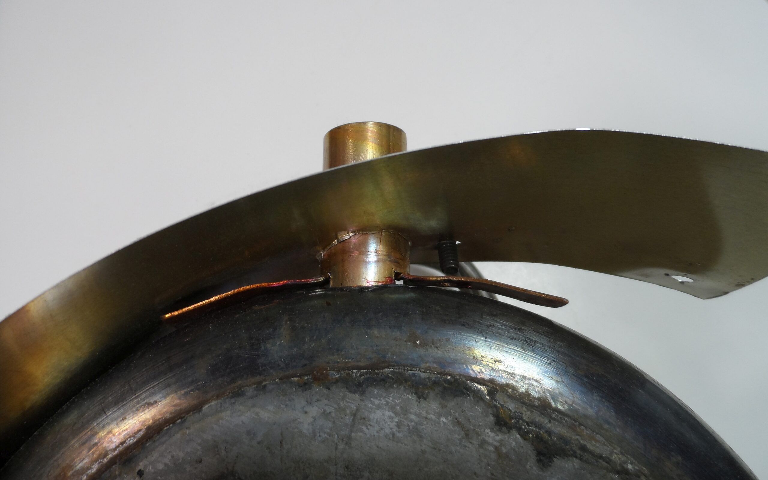 Pot heater. Copper stack fitting attached by slotting and screws. (Photo/ Drew Frye)