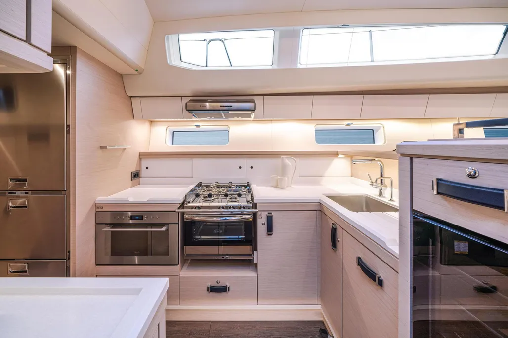Every sailboat cook's dream, to have a front-opening stainless-steel refrigerator compartment and two stainless-steel freezer drawers below. Freezing meals ahead of long passages makes meal prep in difficult conditions light work. (Photo courtesy of YachtWorld.com)
