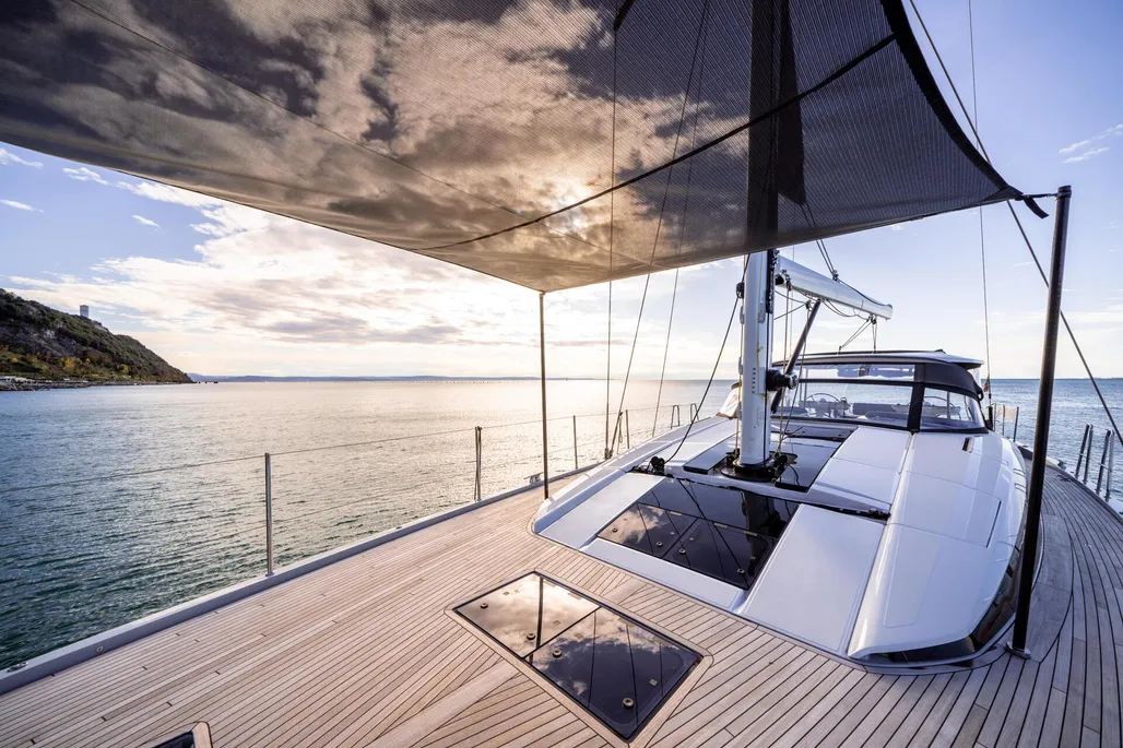 The Jeanneau's sloping side deck and optional bimini deliver the kind of shade and sightlines we love—you can operate from the helm or relax in the lounge without stepping over anyone.(Photo courtesy of YachtWorld.com)