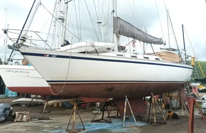 During the survey on this CS 36 in the Dominican Republic, the author found widespread moisture, hidden core rot, and structural concerns beneath her freshly painted topsides.(Photo/ Ray Ville)