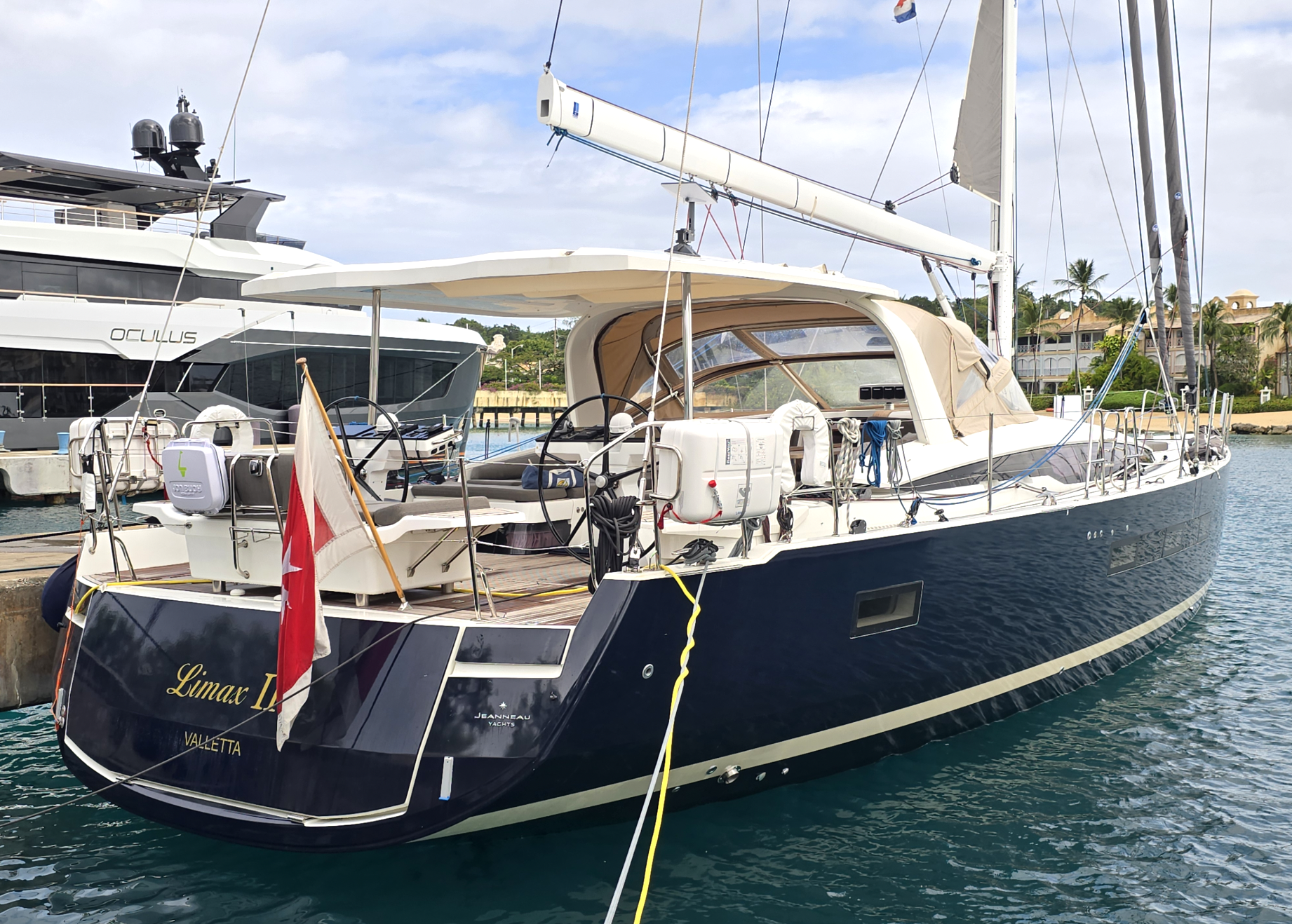 The electric fold-down transom provides access to a substantial dinghy garage and swim platform. If you are offshore, you can reach the garage via a cockpit hatch. (Photo/ BVI Yacht Sales)