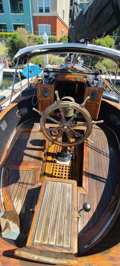 The Union 36's snug cockpit has high coamings and a small footwell drained by two 1-in. scuppers. Its a cozy atmospheric in contrast to today's more sterile fiberglass cockpits. (Photo/ Seattle Yachts)