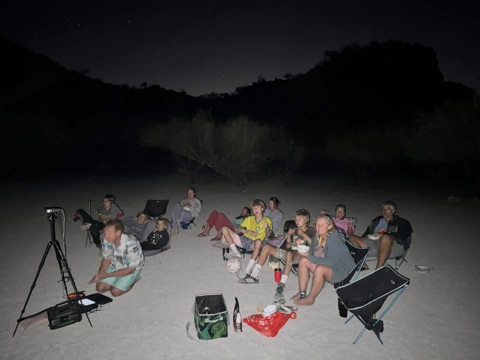 Movie projectors are versatile, you can use them aboard and set them up on land too. It is a great way to bring cruisers together, especially when noone's boat can accommodate the whole anchorage at once. (Photo/Jaclyn Jeffrey)