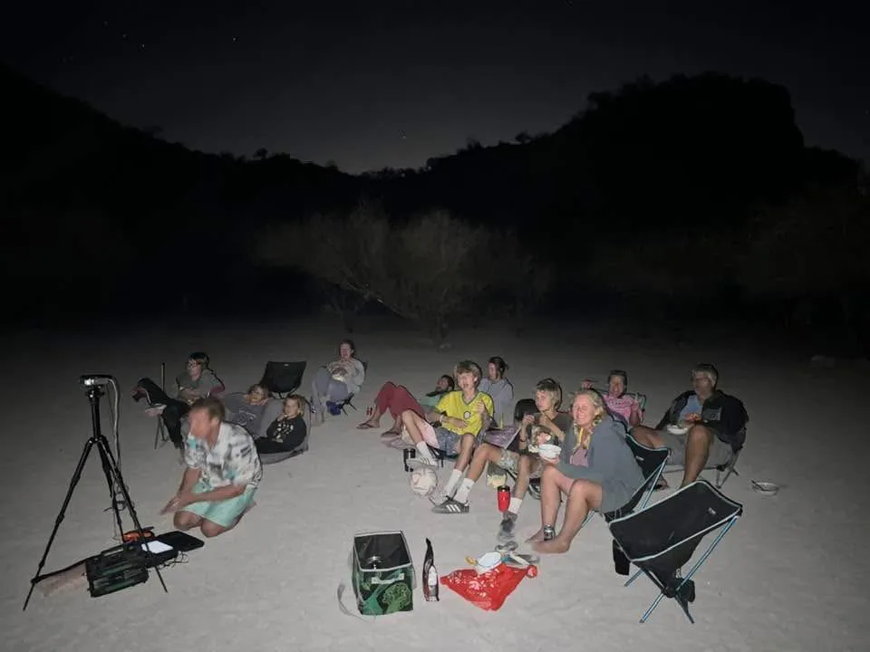 Movie projectors are versatile, you can use them aboard and set them up on land too. It is a great way to bring cruisers together, especially when noone's boat can accommodate the whole anchorage at once. (Photo/Jaclyn Jeffrey)
