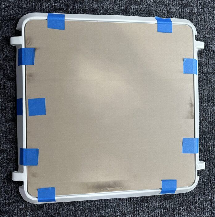 replace lense in hatch frame