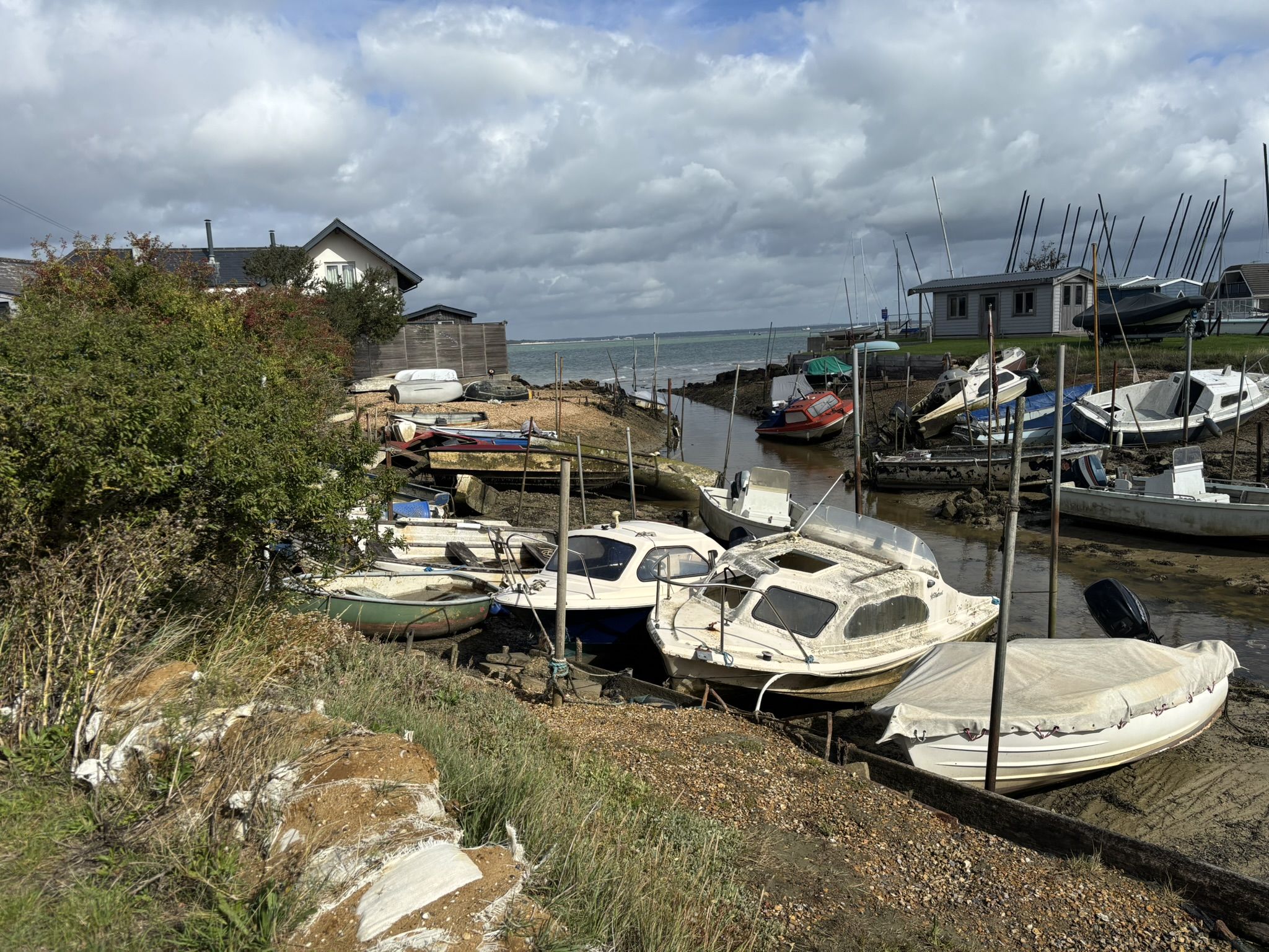 Abandoned boats rotting in a small river system between residential housing on the Isle of Wight. (Photo/ Anonymously uploaded to the Bad Boats map)