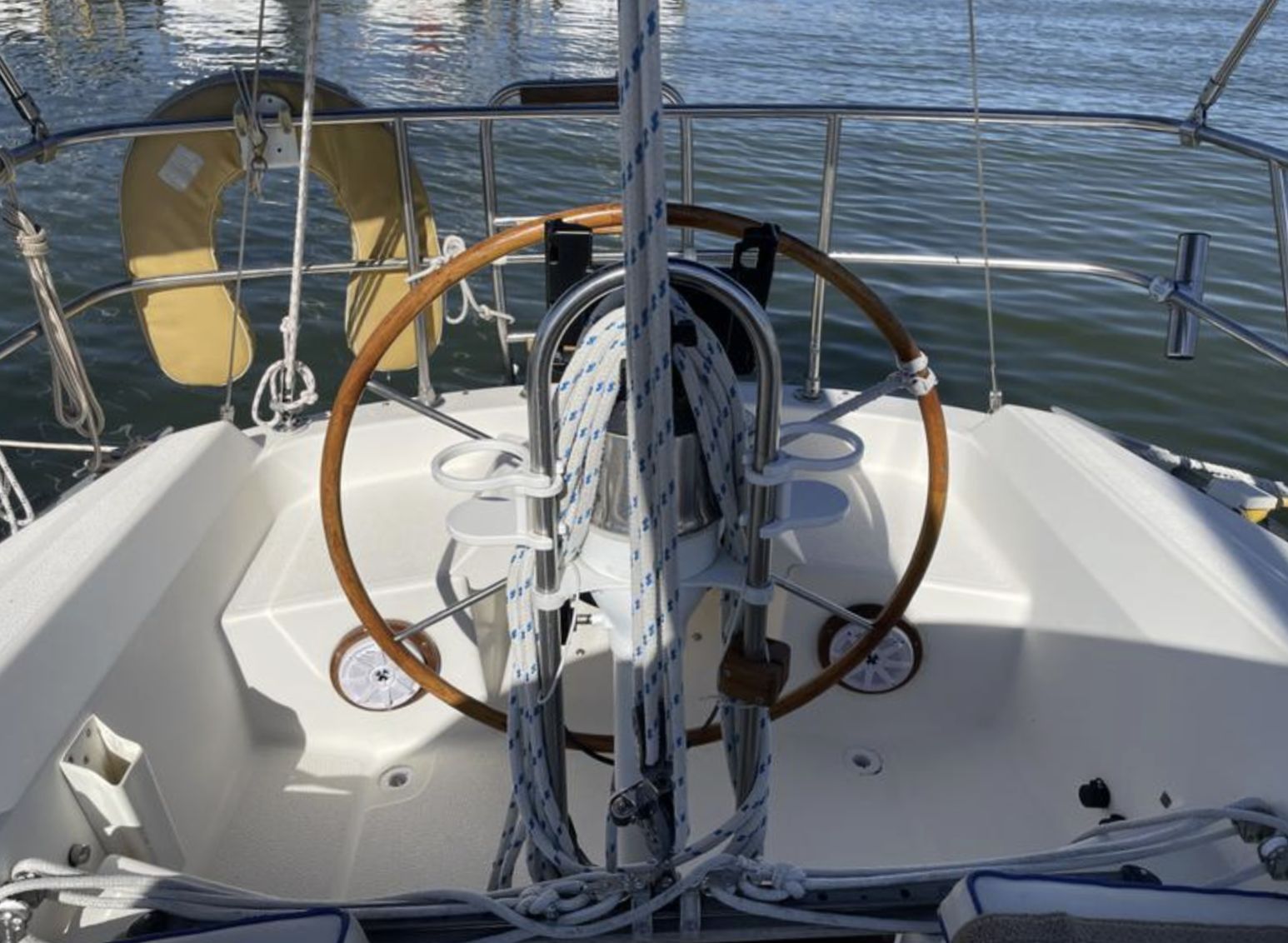 Genoa sheet winches sit just forward of the traveler—good for shorthanded cruising, but racers would prefer them further forward to keep trimmers clear of the helmsperson. (Photo courtesy of SailboatListings.com)